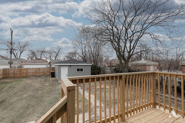 wooden deck with an outdoor structure