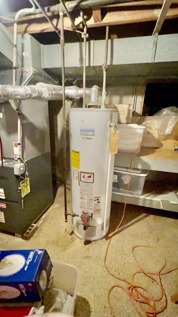 utilities with gas water heater and heating unit