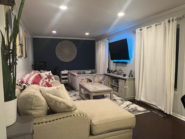 living room featuring ornamental molding and wood-type flooring