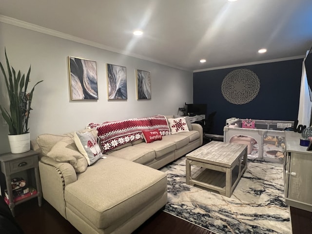 living room with crown molding and hardwood / wood-style flooring