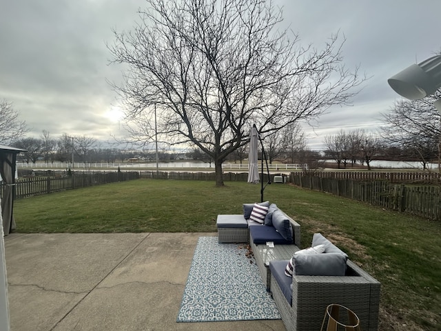 view of yard featuring a patio and outdoor lounge area