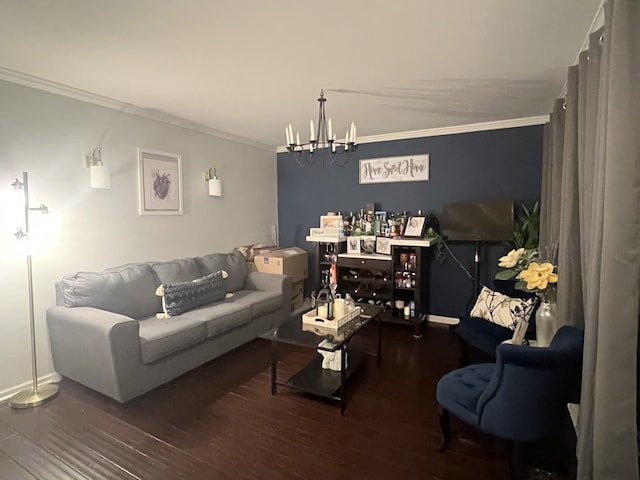 living room with hardwood / wood-style flooring, ornamental molding, and a chandelier