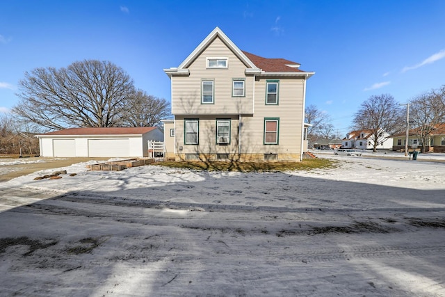 view of front of house with an outbuilding and a garage