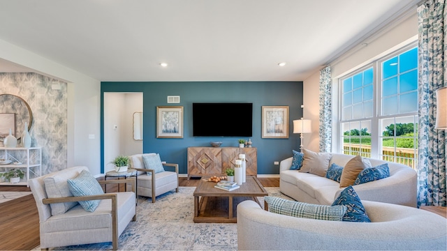 living room with light hardwood / wood-style flooring