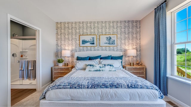 14824 S Dyer Ln, Plainfield, IL 60544 - bedroom featuring an accent wall, wallpapered walls, and wood finished floors
