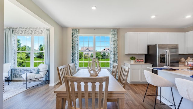 dining room featuring light wood-type flooring