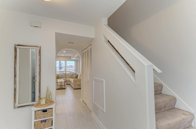 stairway featuring hardwood / wood-style flooring