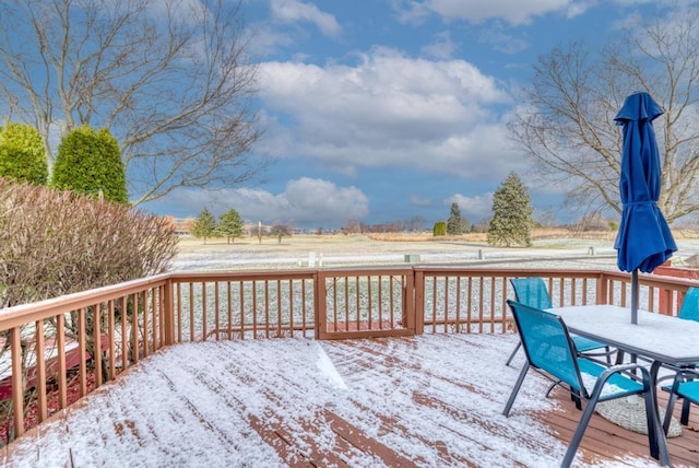 view of snow covered deck