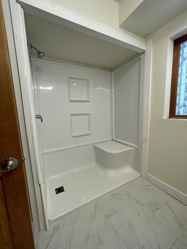 bathroom with a shower