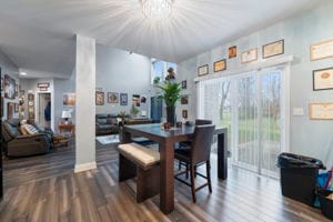 dining room featuring dark hardwood / wood-style flooring and a notable chandelier