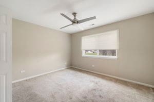 spare room with light carpet