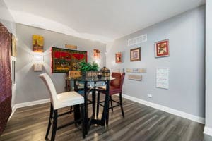 dining area with dark hardwood / wood-style flooring