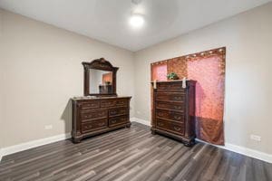 bedroom featuring dark wood-type flooring