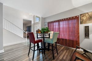 dining room with hardwood / wood-style flooring