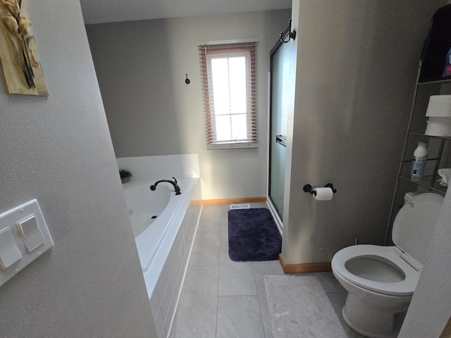 bathroom with tile patterned floors, independent shower and bath, and toilet