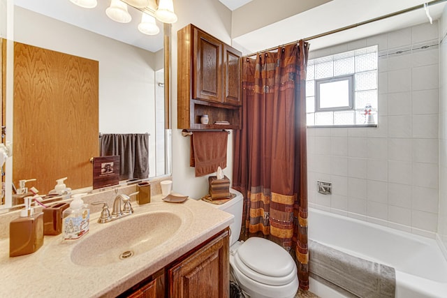 full bathroom with vanity, toilet, and shower / tub combo