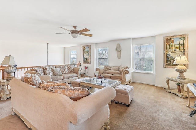 living room with ceiling fan and light carpet