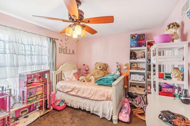 carpeted bedroom featuring ceiling fan