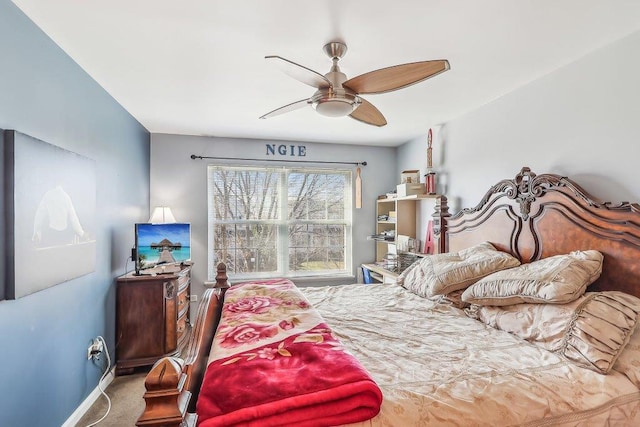 bedroom with ceiling fan and carpet floors