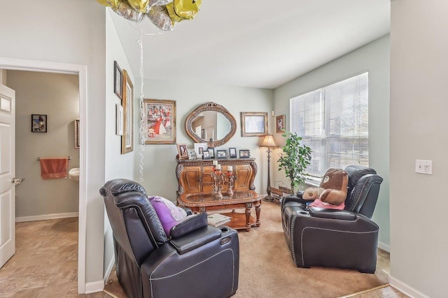 sitting room with light carpet