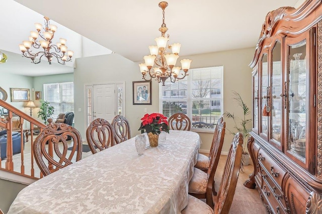 dining area featuring a chandelier