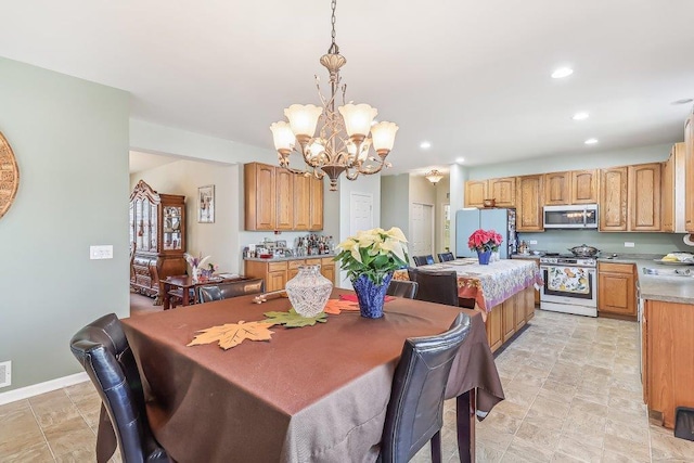 dining area with a chandelier