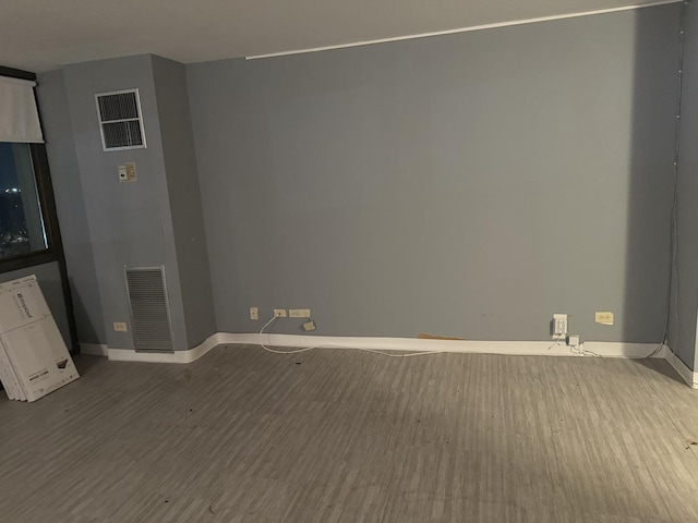 unfurnished room featuring light hardwood / wood-style flooring