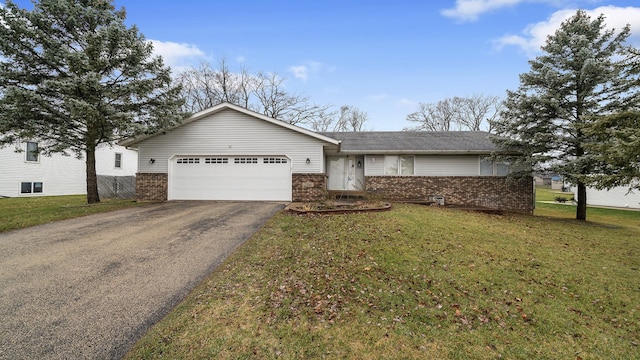 single story home with a front lawn and a garage