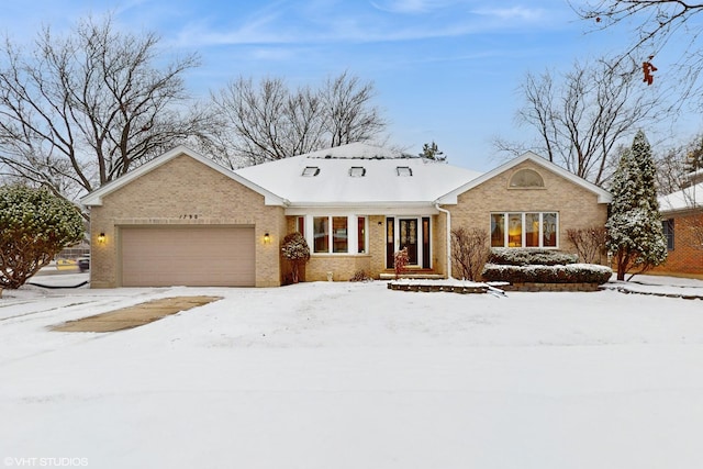 single story home with a garage