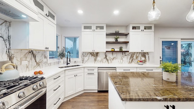 kitchen featuring sink, white cabinets, and appliances with stainless steel finishes