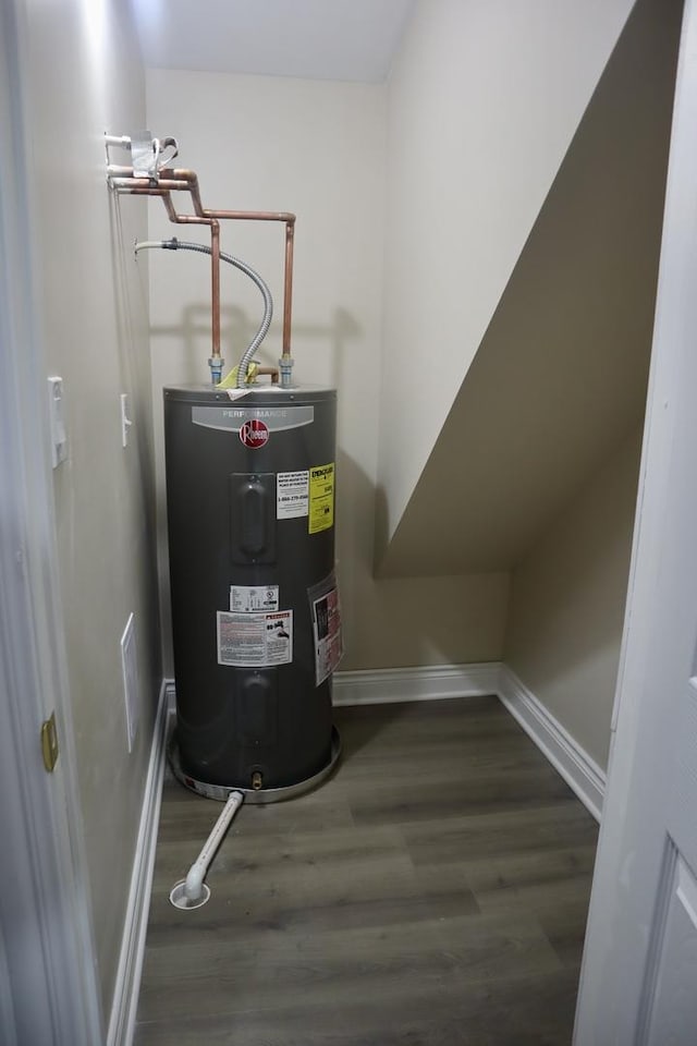 utility room featuring water heater