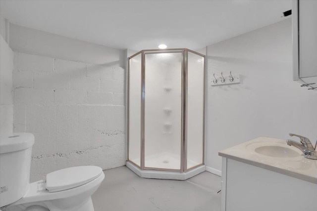 bathroom with vanity, concrete flooring, an enclosed shower, and toilet