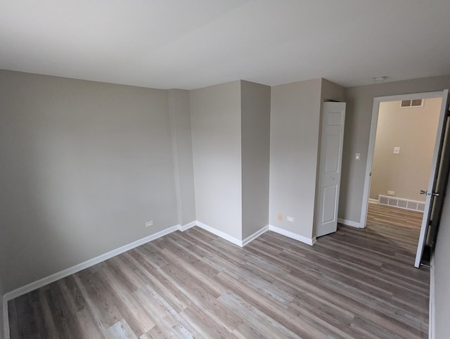 empty room featuring light hardwood / wood-style flooring