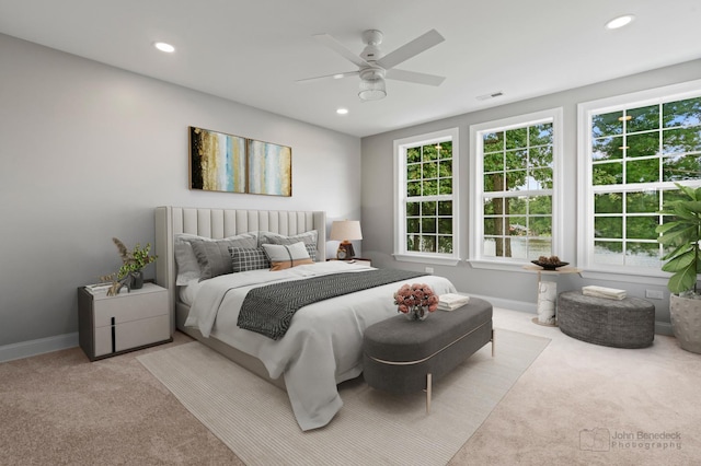 carpeted bedroom with ceiling fan