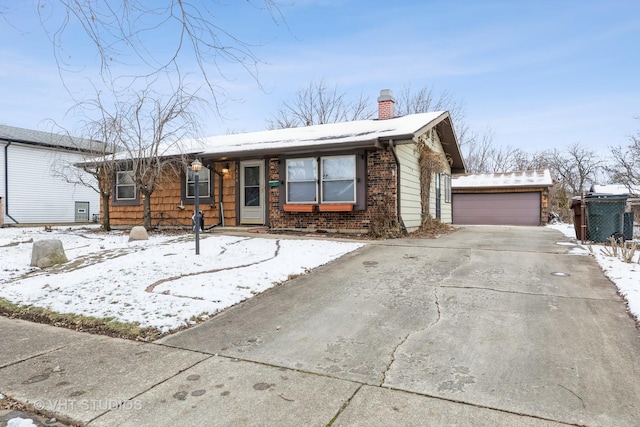 single story home featuring a garage