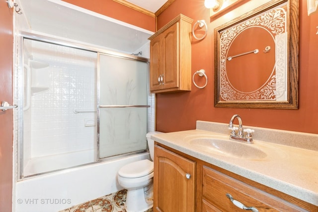 full bathroom with toilet, vanity, and combined bath / shower with glass door