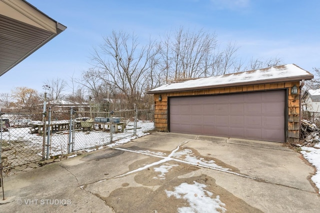 view of snow covered garage