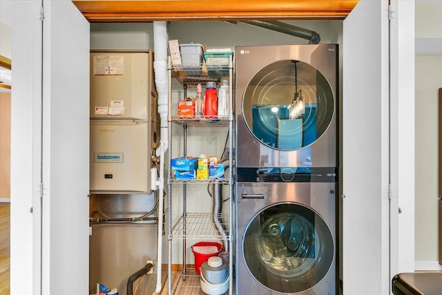 washroom with stacked washer and dryer