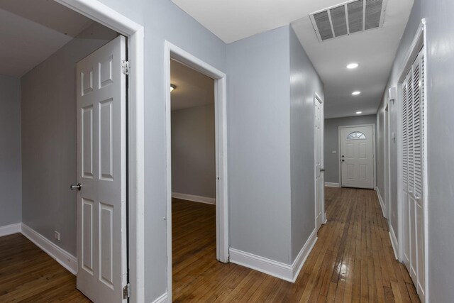 spare room featuring dark hardwood / wood-style flooring