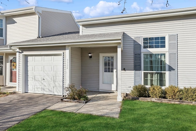 property entrance with a garage