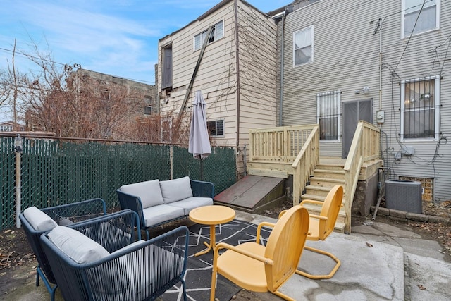 view of patio / terrace with an outdoor hangout area and cooling unit