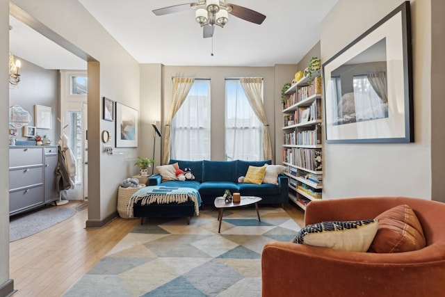 sitting room featuring ceiling fan and light hardwood / wood-style flooring