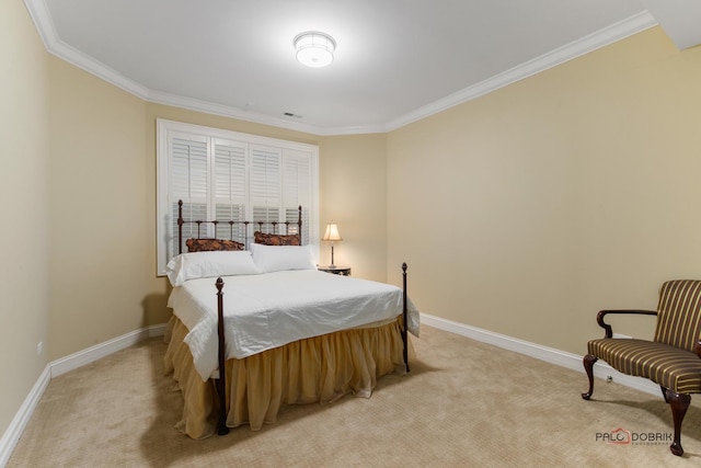 carpeted bedroom with ornamental molding