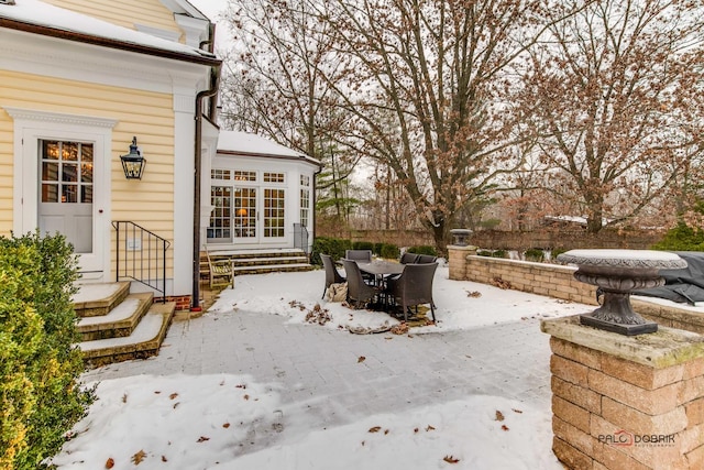 view of snow covered patio