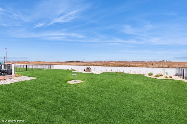 view of yard with a water view