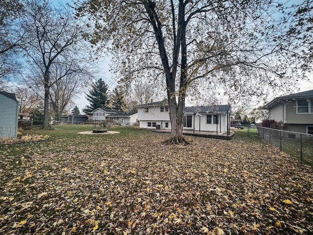 view of yard with an outdoor fire pit