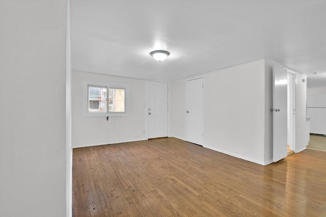 empty room featuring hardwood / wood-style flooring