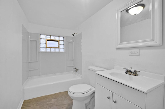 full bathroom featuring toilet, vanity, and washtub / shower combination