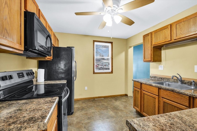 kitchen with electric range, ceiling fan, and sink