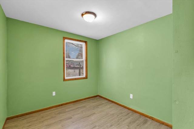 spare room with light hardwood / wood-style floors